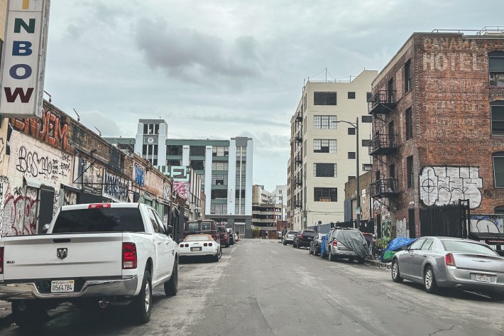 a street with parked cars