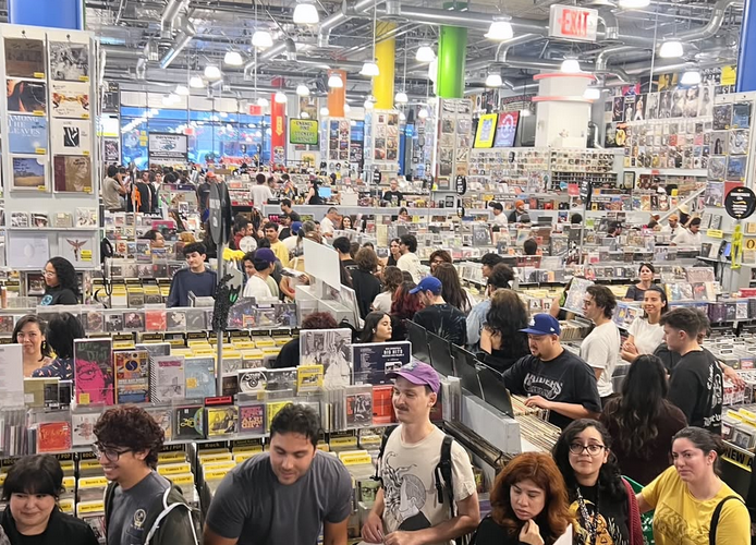 a large record shop full of customers