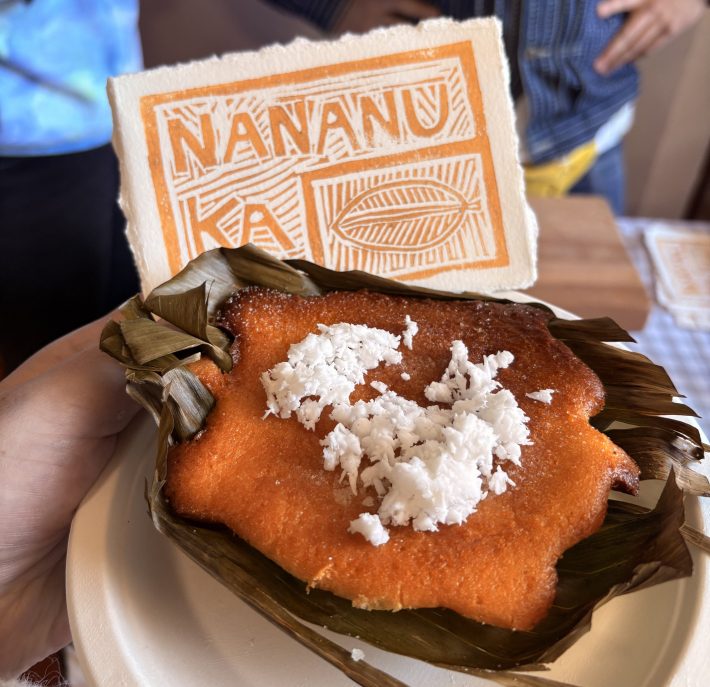 a plate of bibingka, a filipino and orange-colored dessert