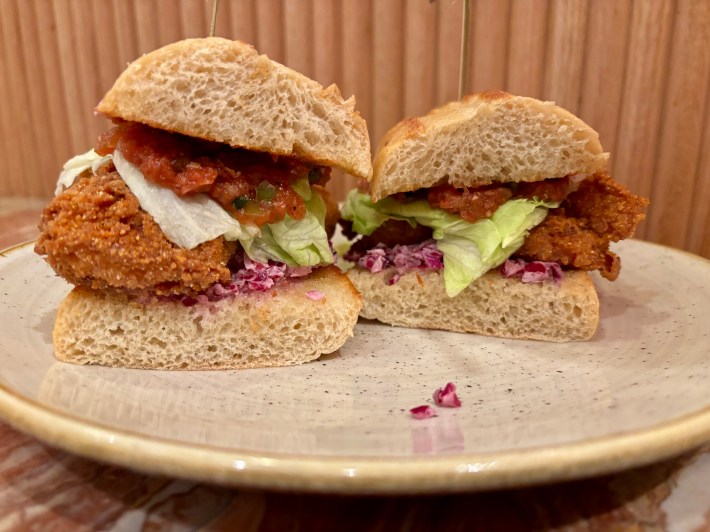a cross-section of a fried shrimp po'boy