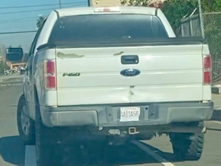 a shot of a white truck from behind