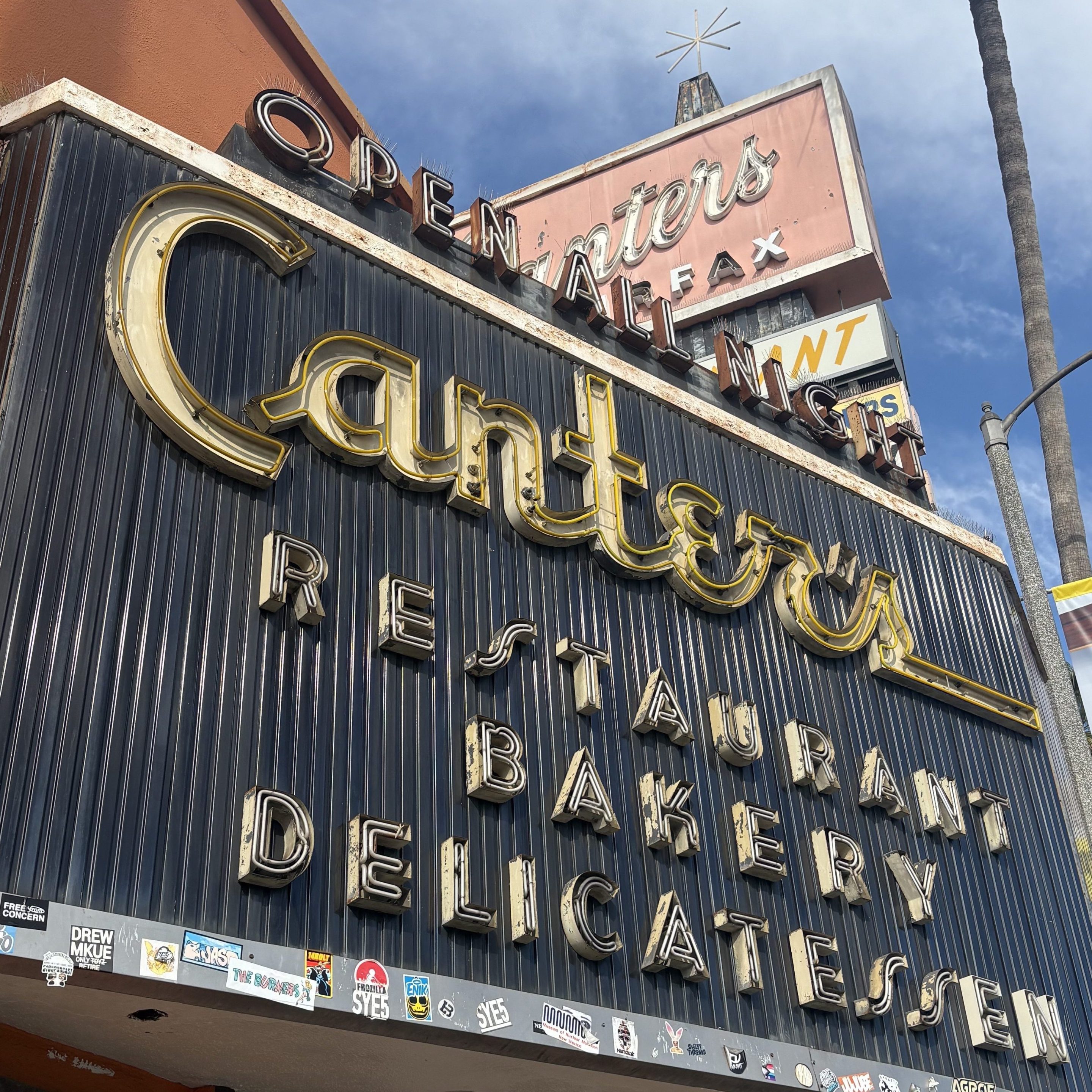 a building sign reading "Canter's Restaurant Bakery Delicatessen"