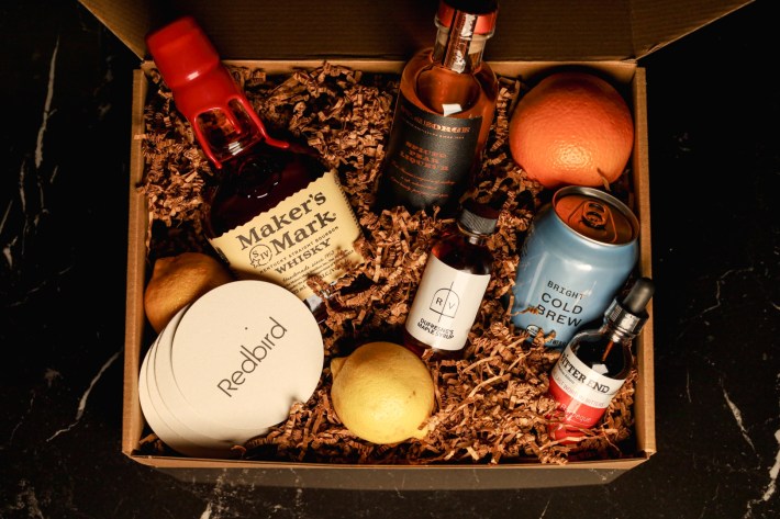 a gift basket of alcoholic drinks