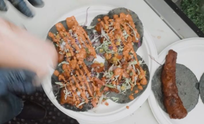 Villa's Tacos #3's fish tacos getting sauced. Photo by Javier Cabral for L.A. TACO.