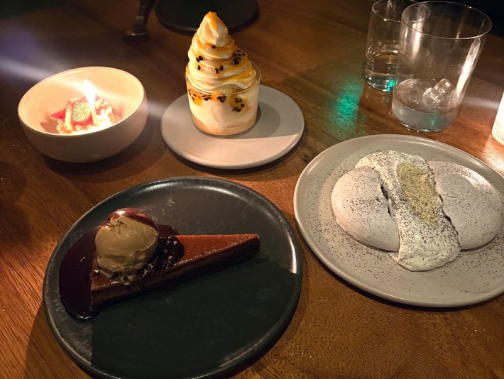 dishes of desserts: chocolate cake,