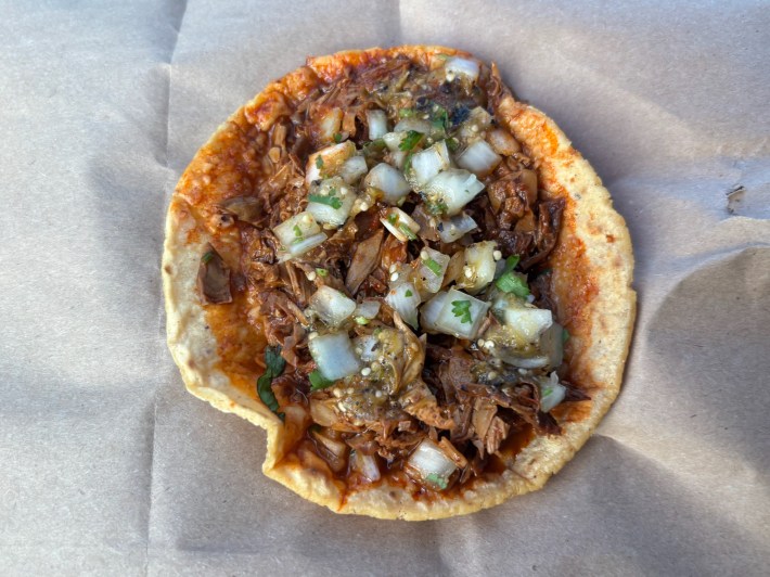 a taco with stewed tofu skin