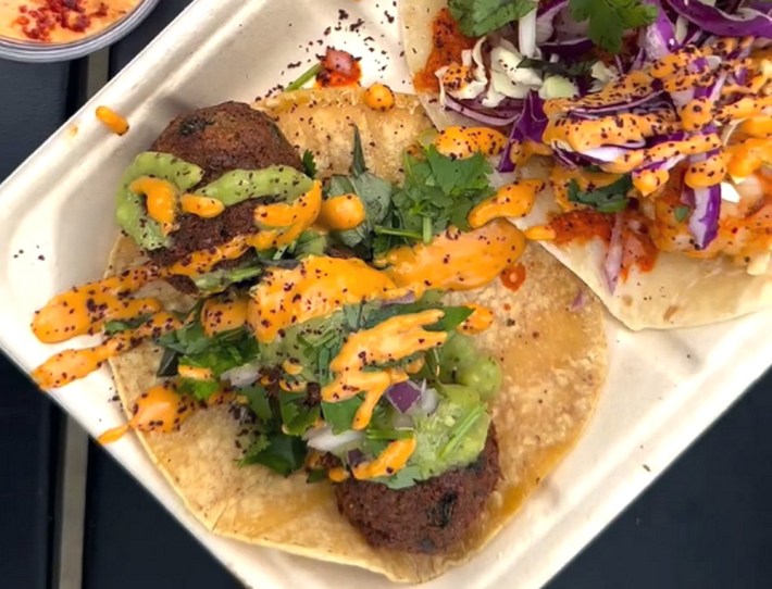 a falafel taco on a corn tortilla