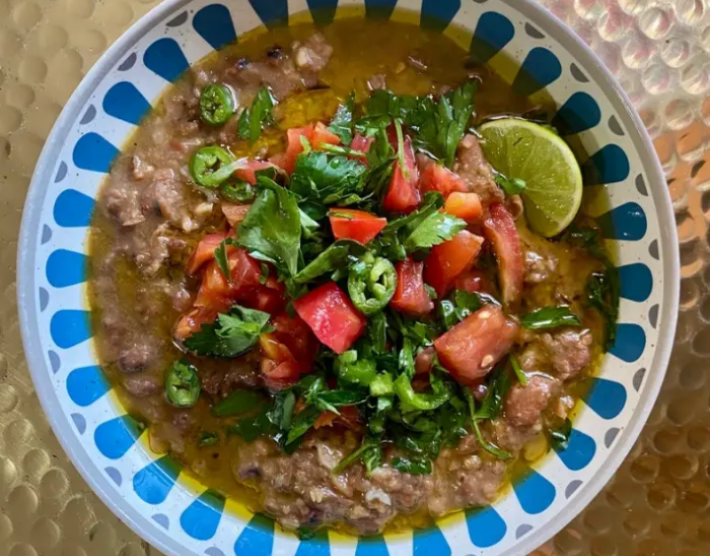 Lentil soup with jalapeno, cilantro, tomato, and lime.