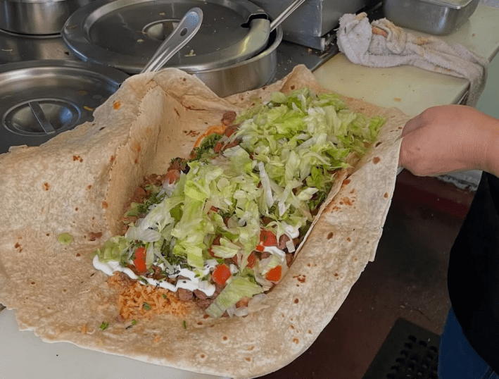 A 5-lb. burrito under construction