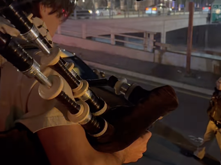 bagpipes being played by a young man