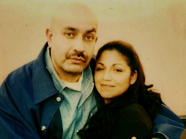 a man and woman embracing