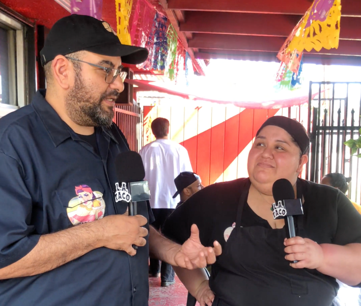 a man and woman holding mircophones