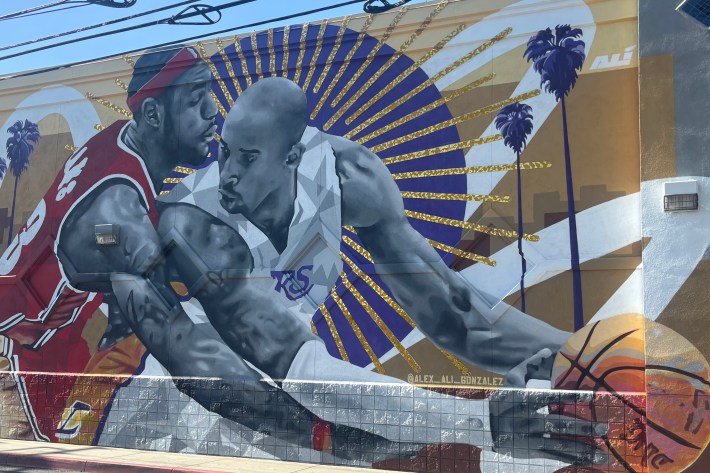 a mural of basketball players