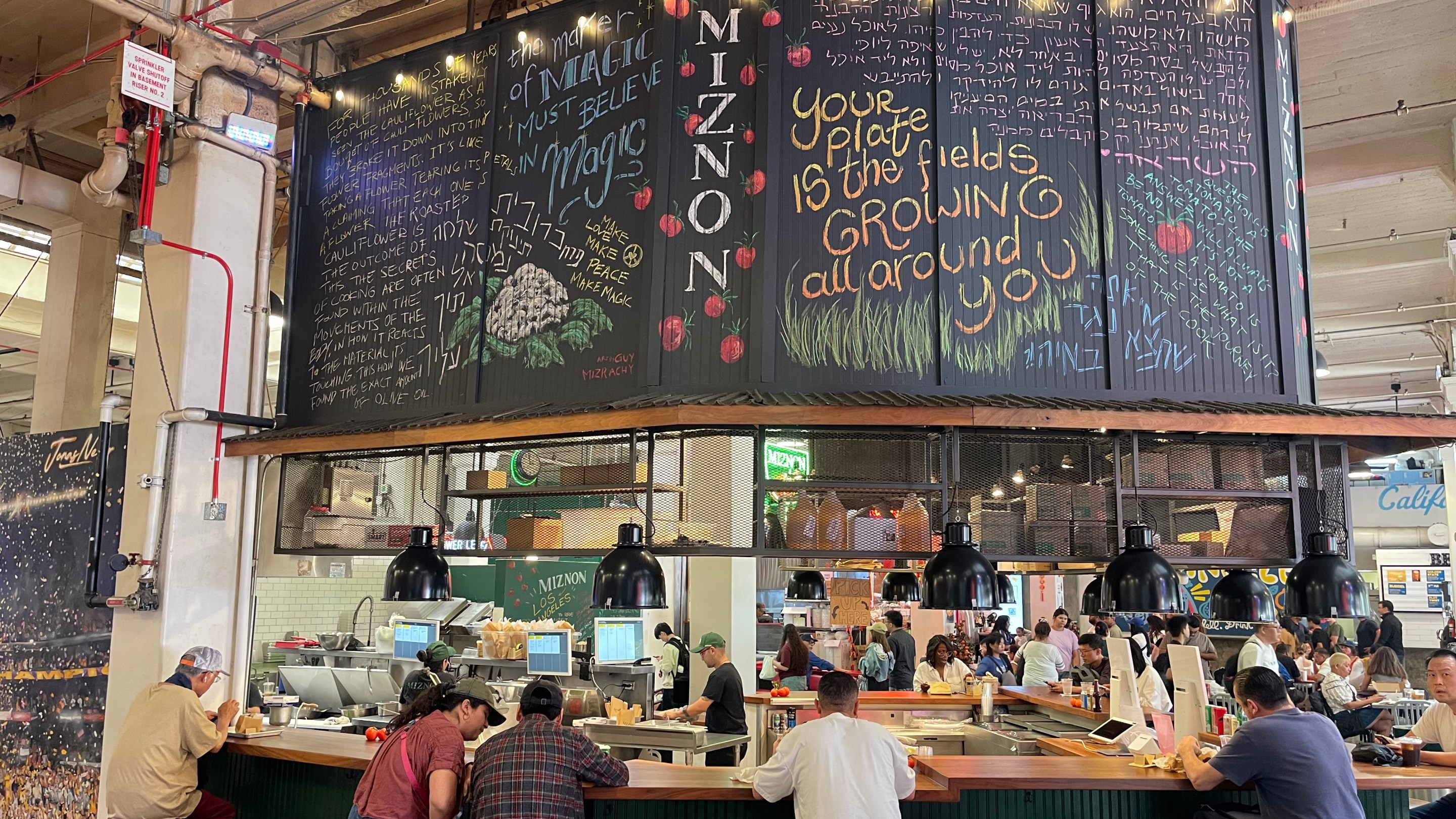 customers sitting at a restaurant bar