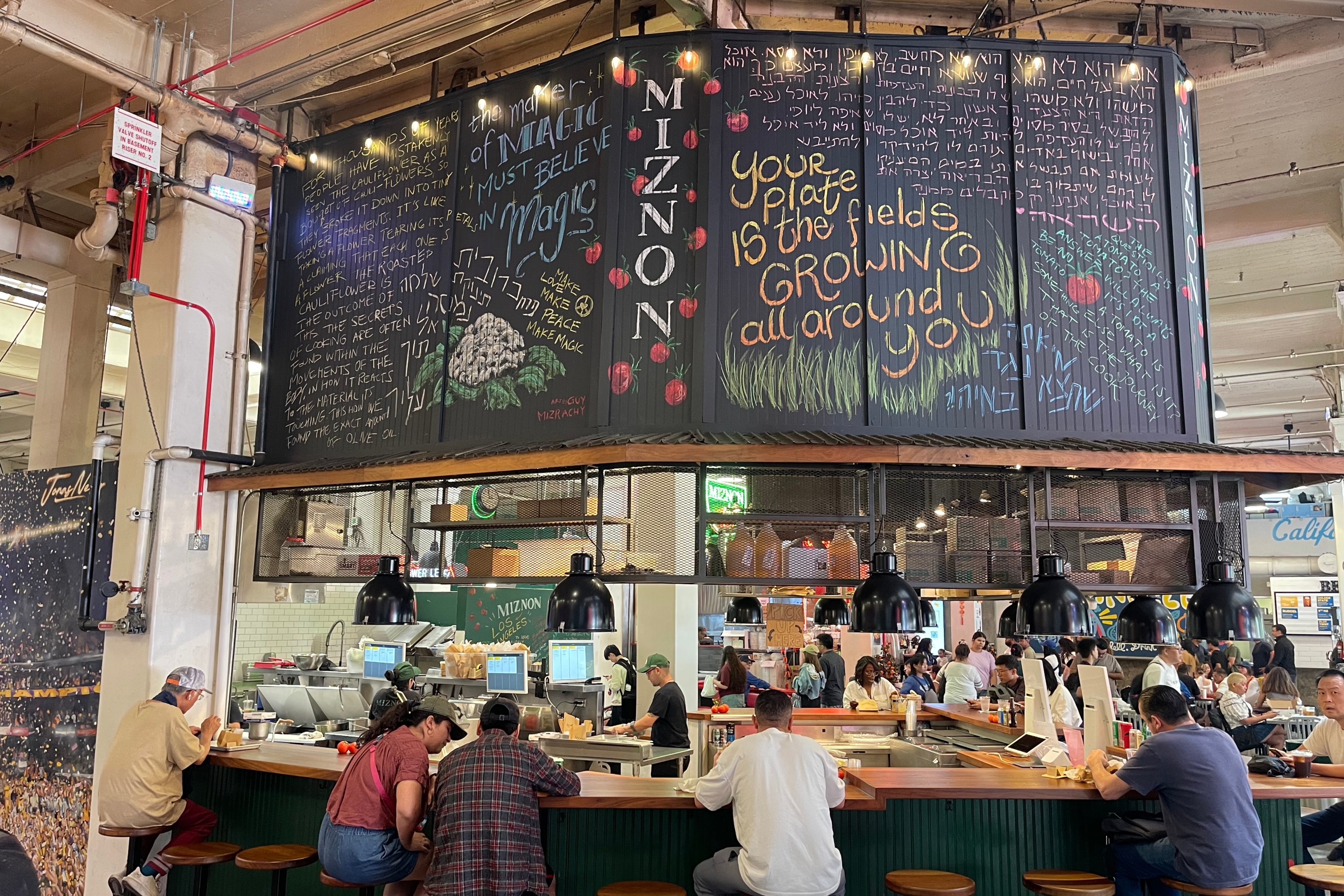 customers sitting at a restaurant bar
