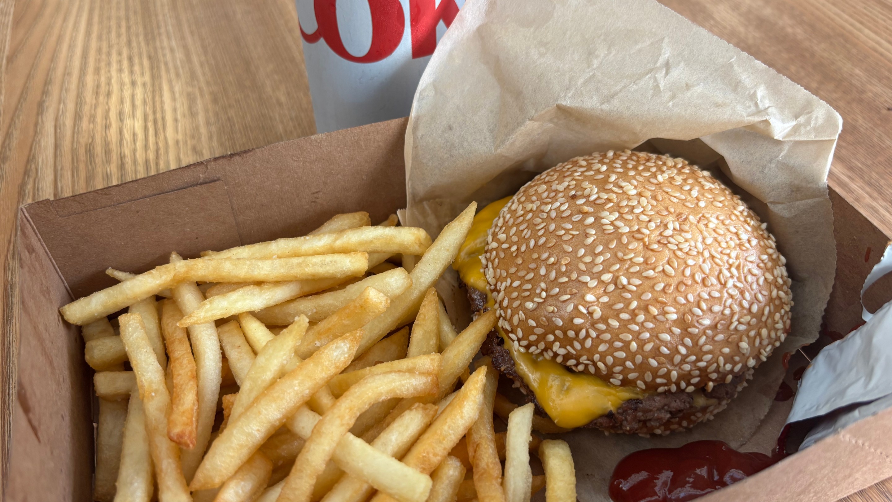 fries, burger, and diet coke can