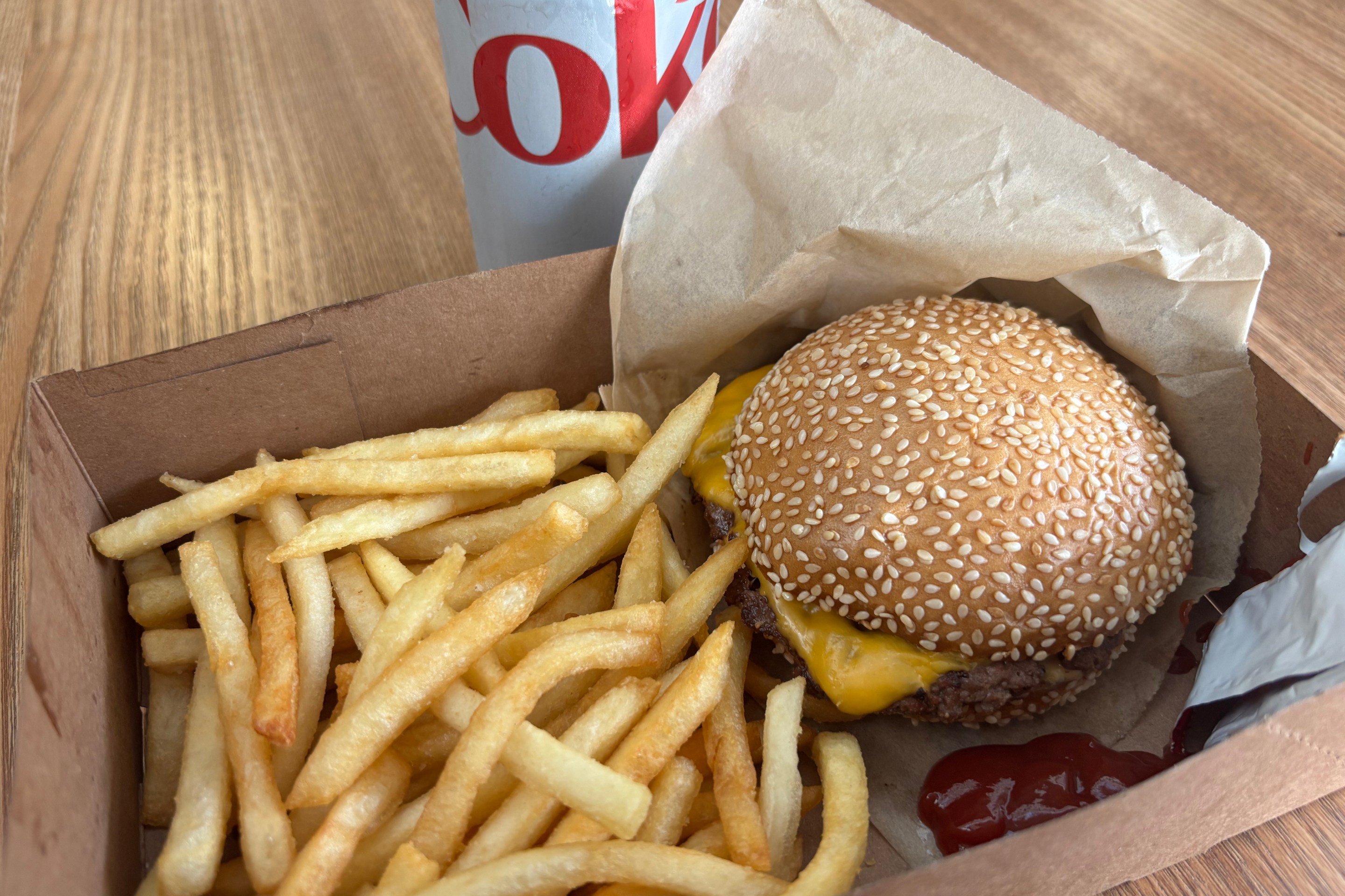 fries, burger, and diet coke can