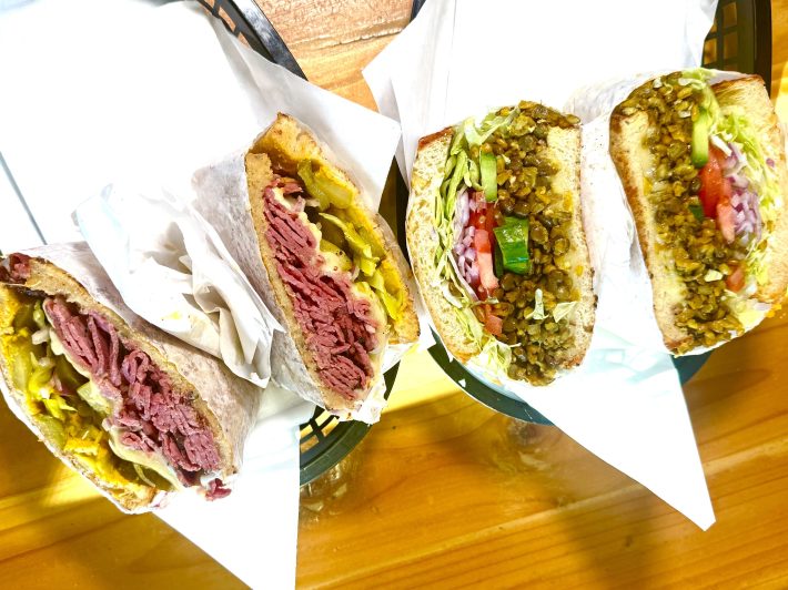 A lentil sandwich (top) and pastrami (bottom) at The Brick Deli in Pomona.