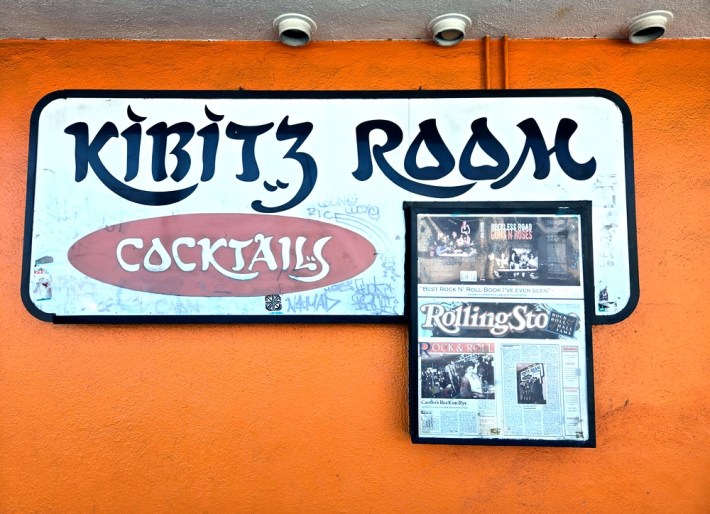 a "Kibitz Room" sign