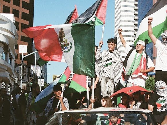 images of a protest with Mexican and Palestinian flags being waved