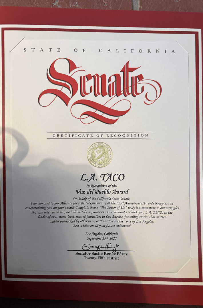 A certificate of recognition from California's Senate, awarding L.A. TACO with the Voz del Pueblo Award in 2025.