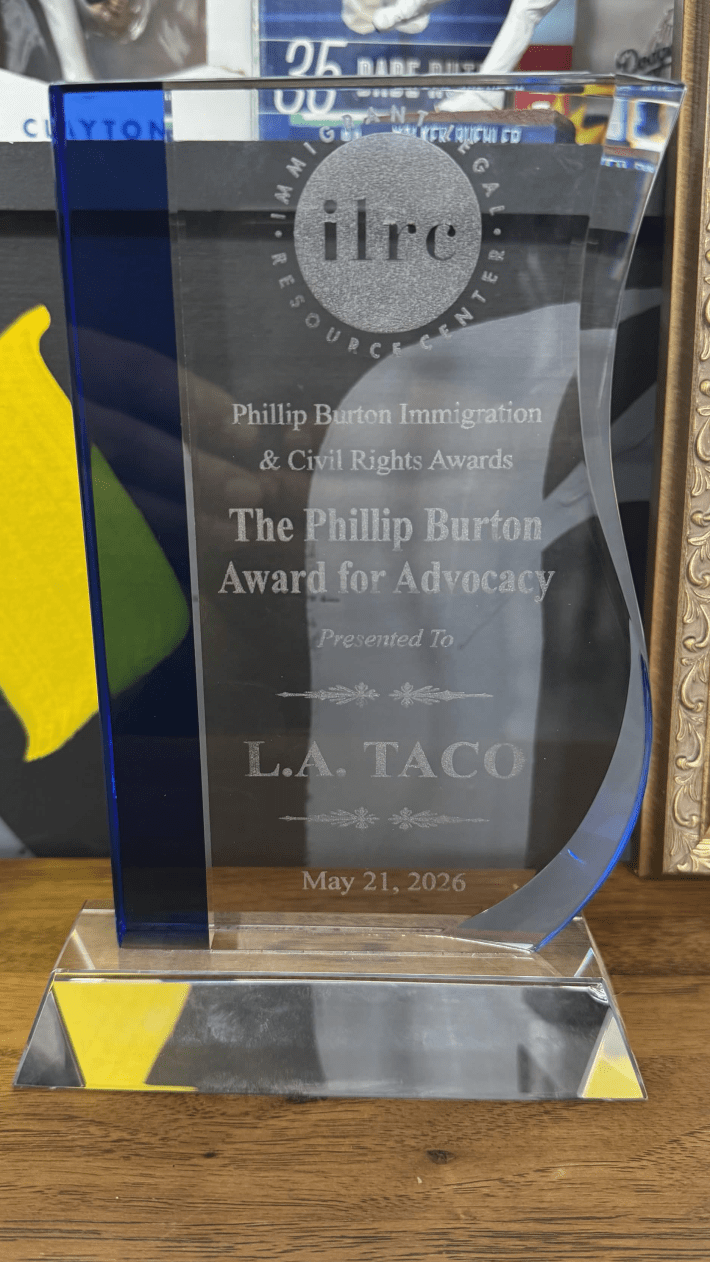 a plaque awarding L.A. TACO with the Phillip Burton Award for Advocacy