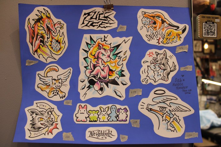 a flash sheet showing a dog humping an ice cube, lettering that says "FUCK ICE," and animals destroying ice cubes