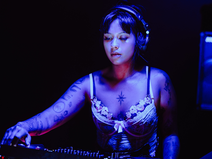 a woman DJs
