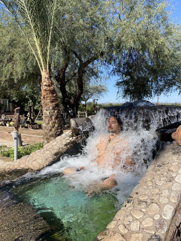 Josh Gil bathing in a waterfall in Ures, Sonora.