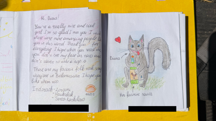 a handwritten note and drawing