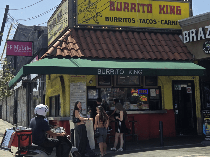 customers outside a burrito shack