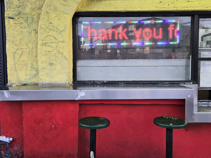 empty seats at a burrito shop