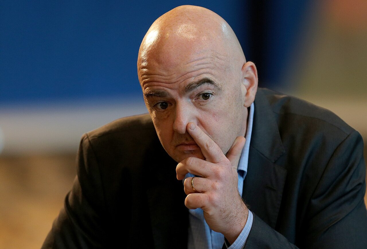 a bald man in a suit