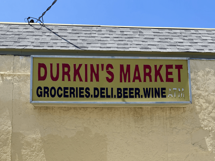 a sign outside of a shop