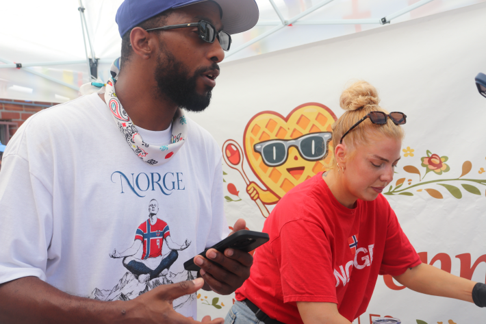 a man and woman working a pop-up