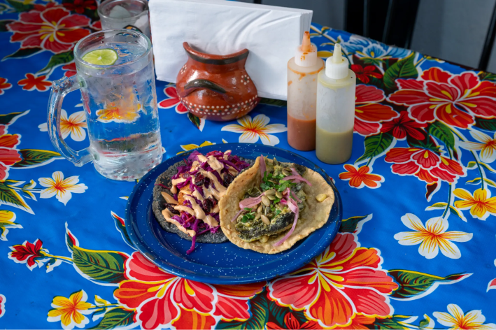 taco plate on a printed tablecloth