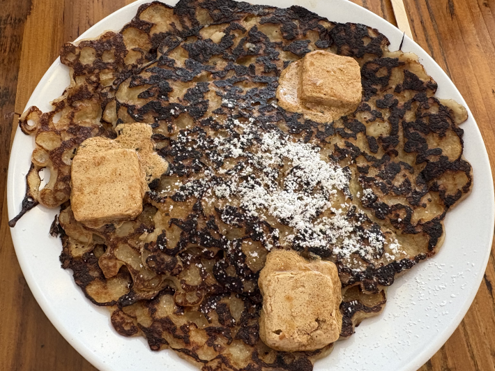 a pancake with cinnamon molasses butter
