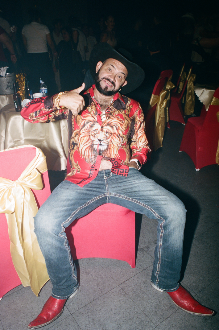 a man sitting at a club