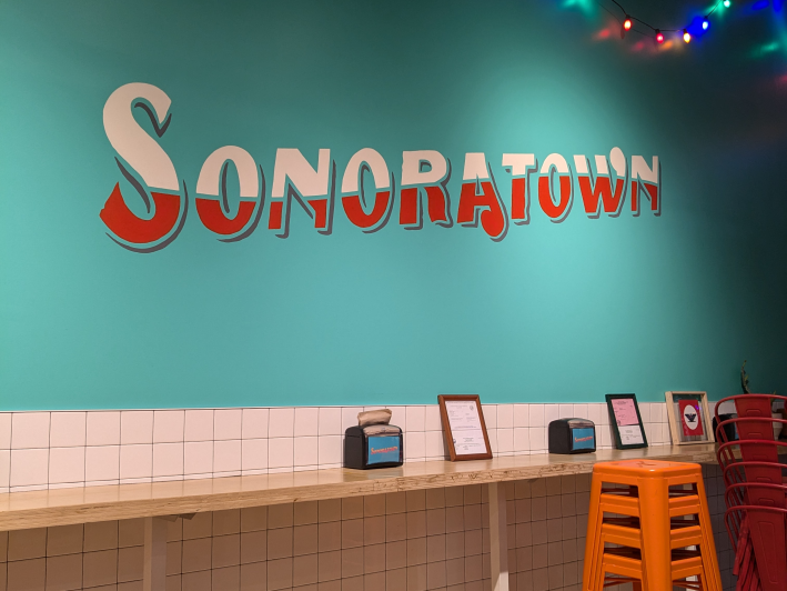 hand-painted mural that says "SONORATOWN"
