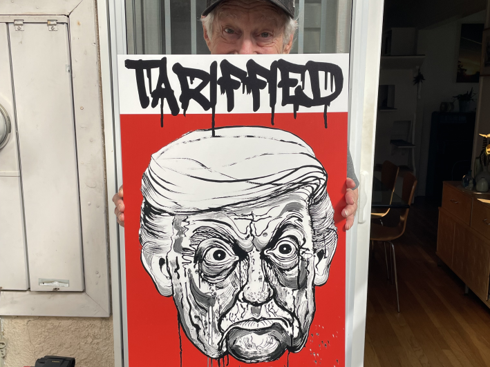 trump's face below the word "Tarrified"