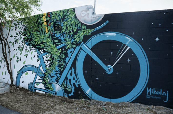 a mural of a large bike