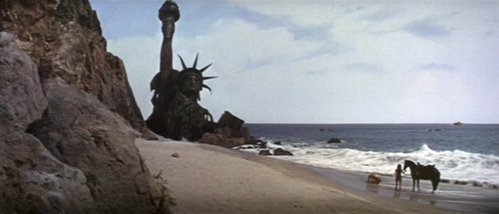 Taylor (Charlton Heston) and Nova (Linda Harrison) happen upon the ruins of the Statue of Liberty