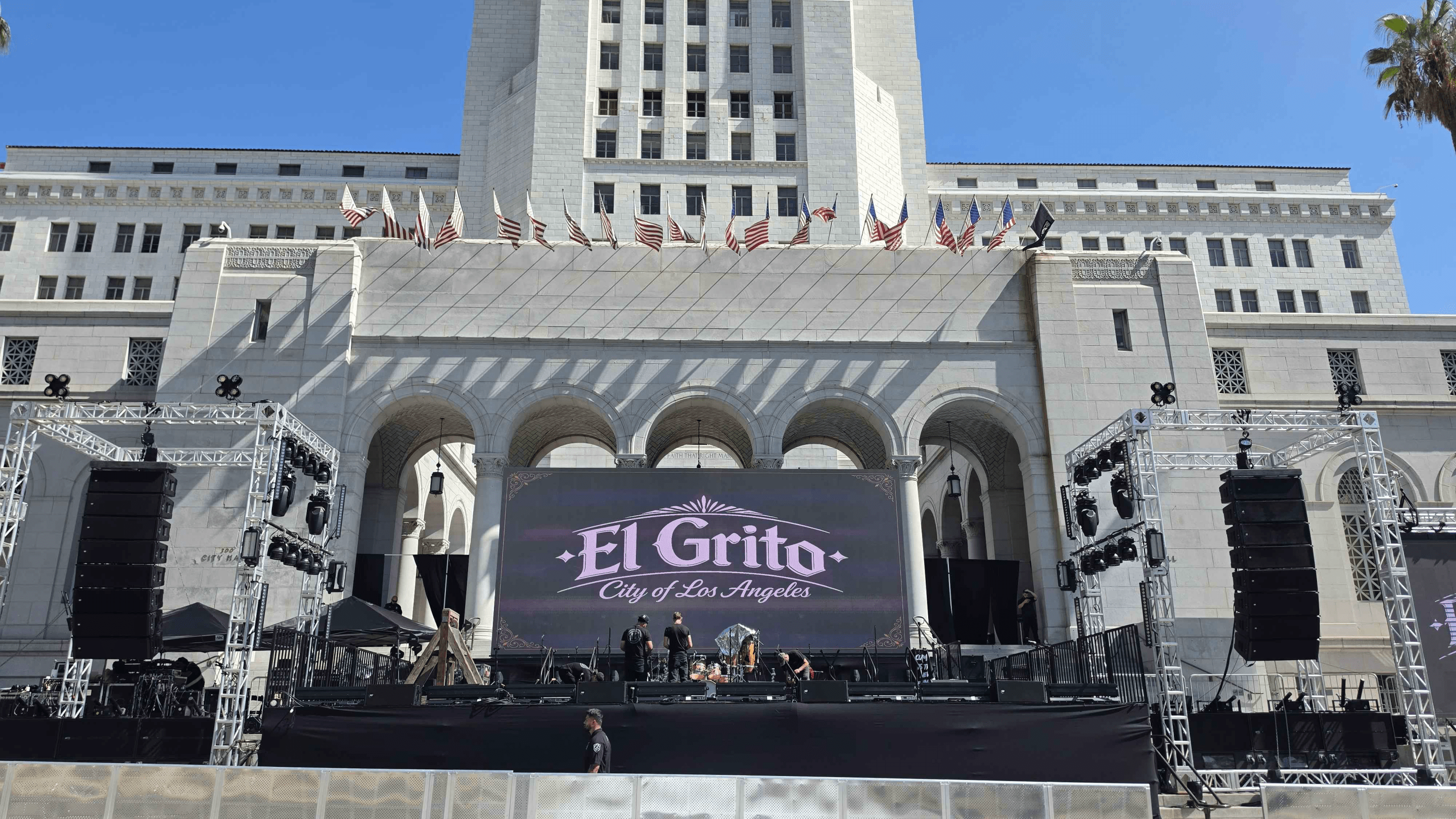 a stage set up outside with the words "El Grito"