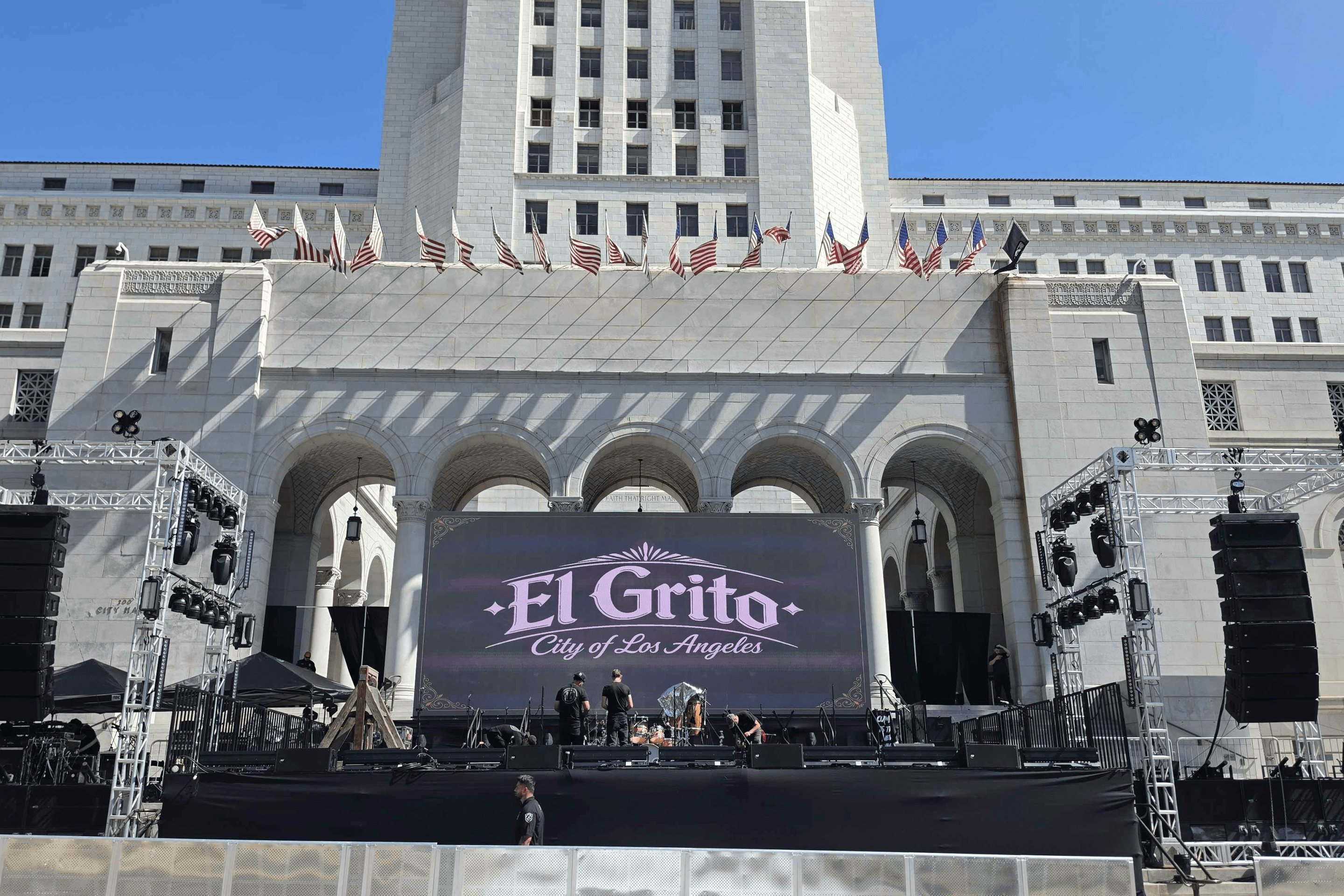 a stage set up outside with the words "El Grito"