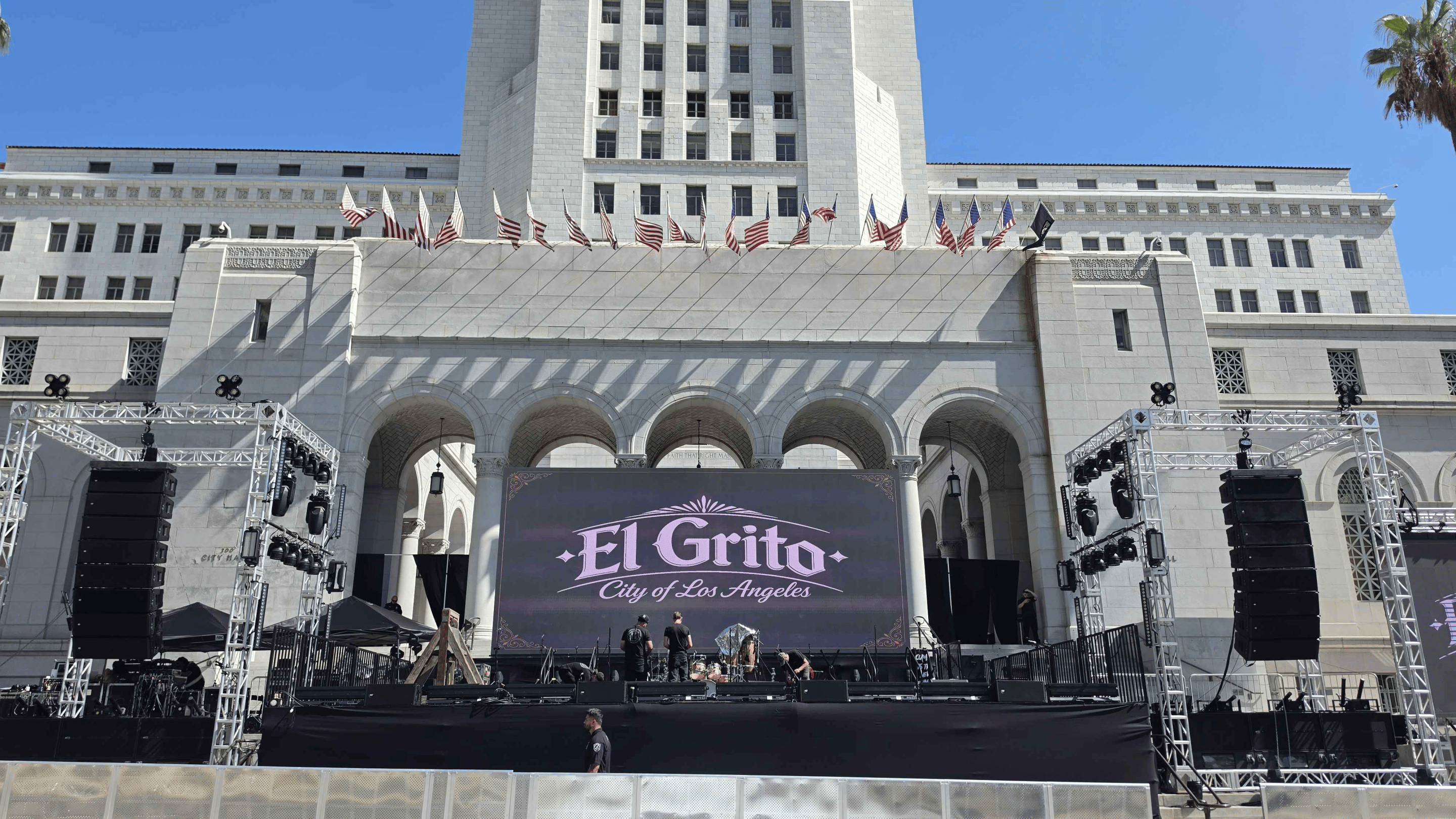 a stage set up outside with the words "El Grito"