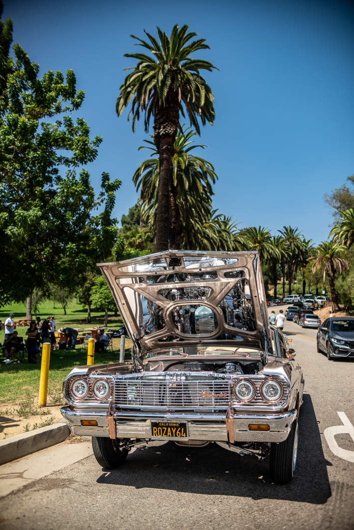 a classic car with its hood open