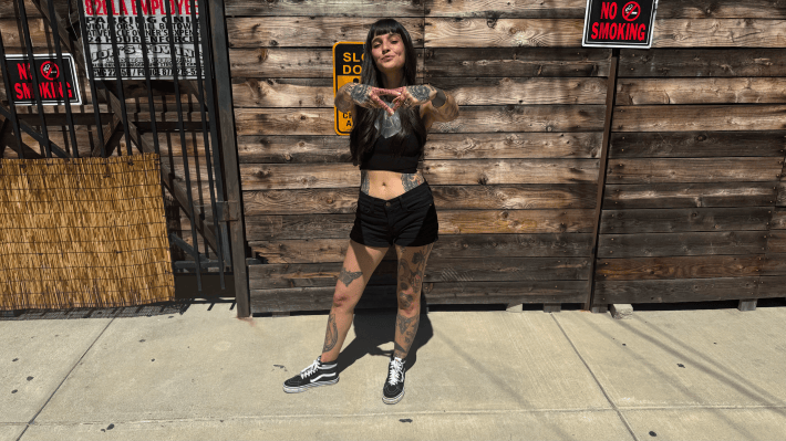a woman on a sidewalk
