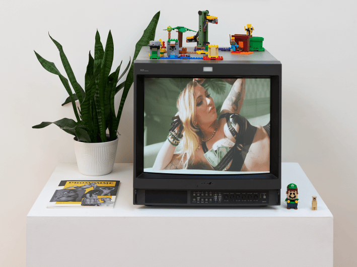 a documentary playing on a square TV