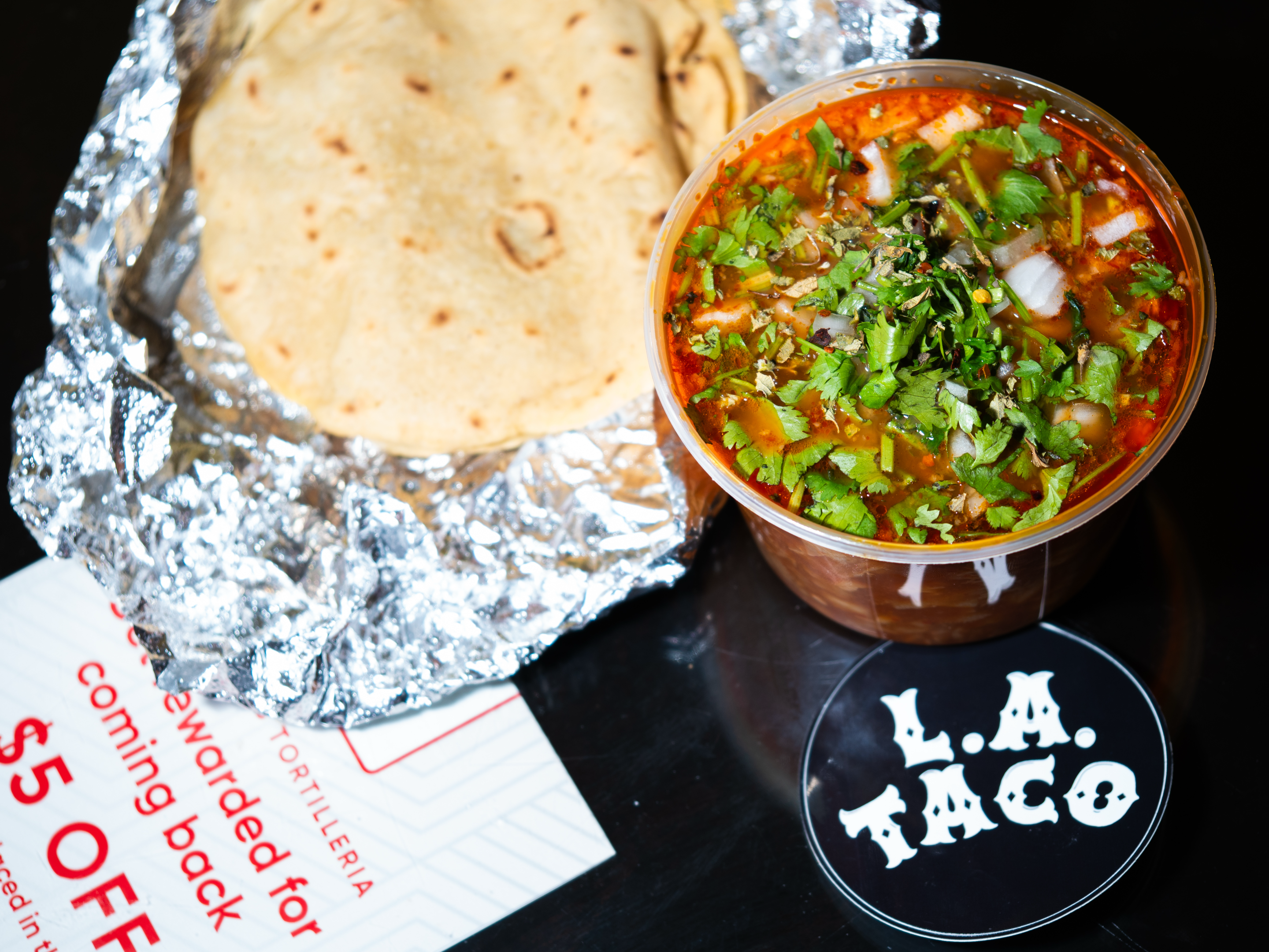 red menudo next to tortillas