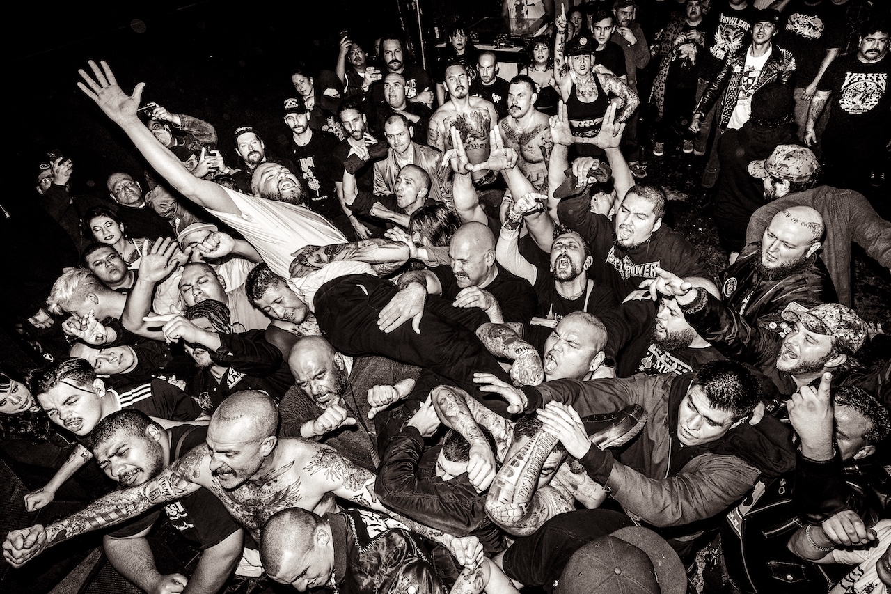 a black and white photo of a crowd of people